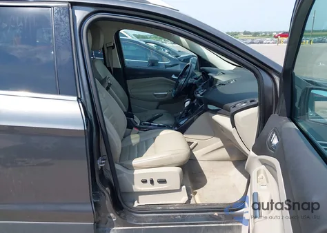 2015 Ford Escape Titanium z USA, uszkodzony, nr VIN 1FMCU9J90FUA08230